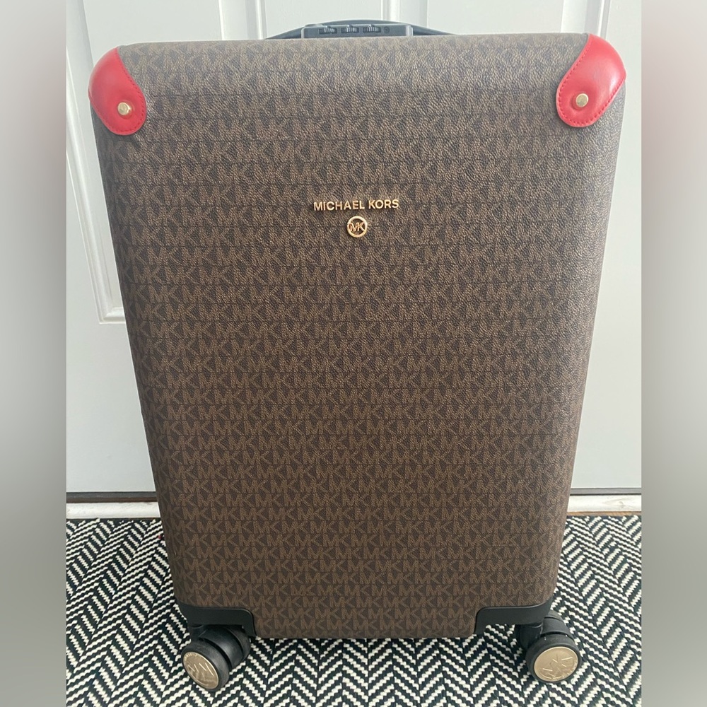 Michael Kors Carry On suitcase with red trim